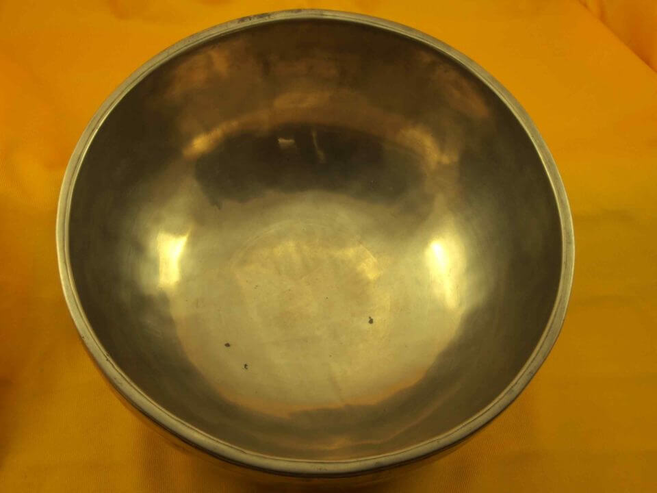 Thick Polished Antique Jambati Singing Bowl with mildly fluttering high