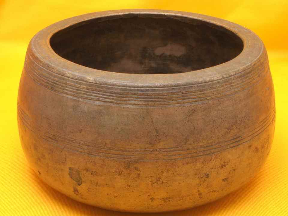 XX Thick Huge Antique Mani Singing Bowl with lots of worn artwork.