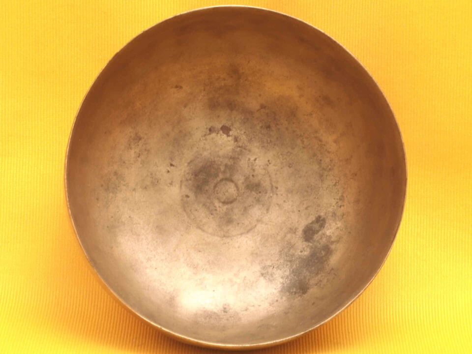 Tiny Antique Thadobati Singing Bowl that is wild and somewhat discordant