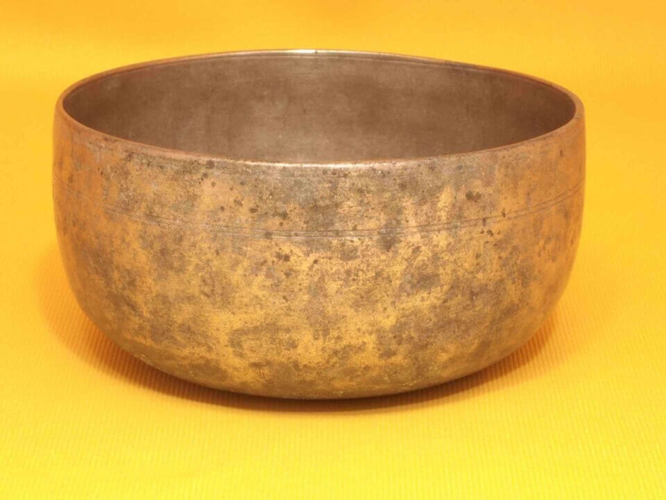 Adorned Antique Thadobati Singing Bowl with brassy sound #5931